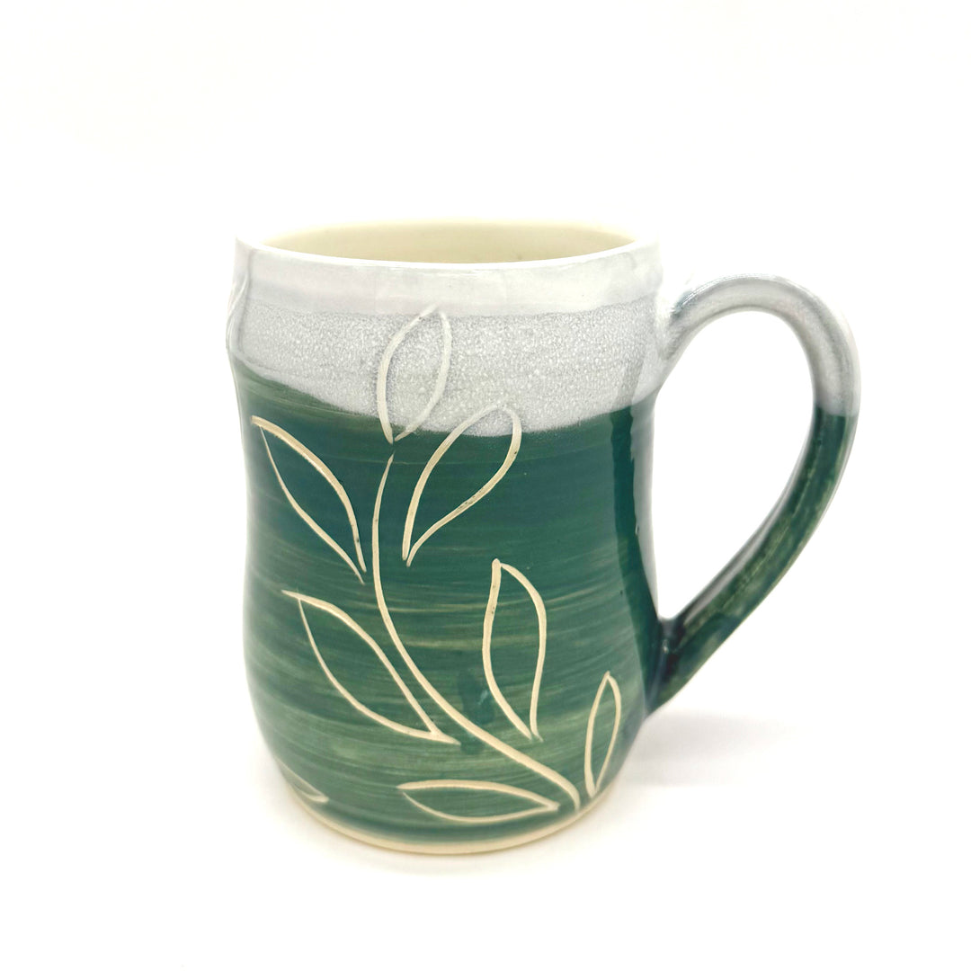 Handmade Ceramic Teal Mug with Carved Leaf Design