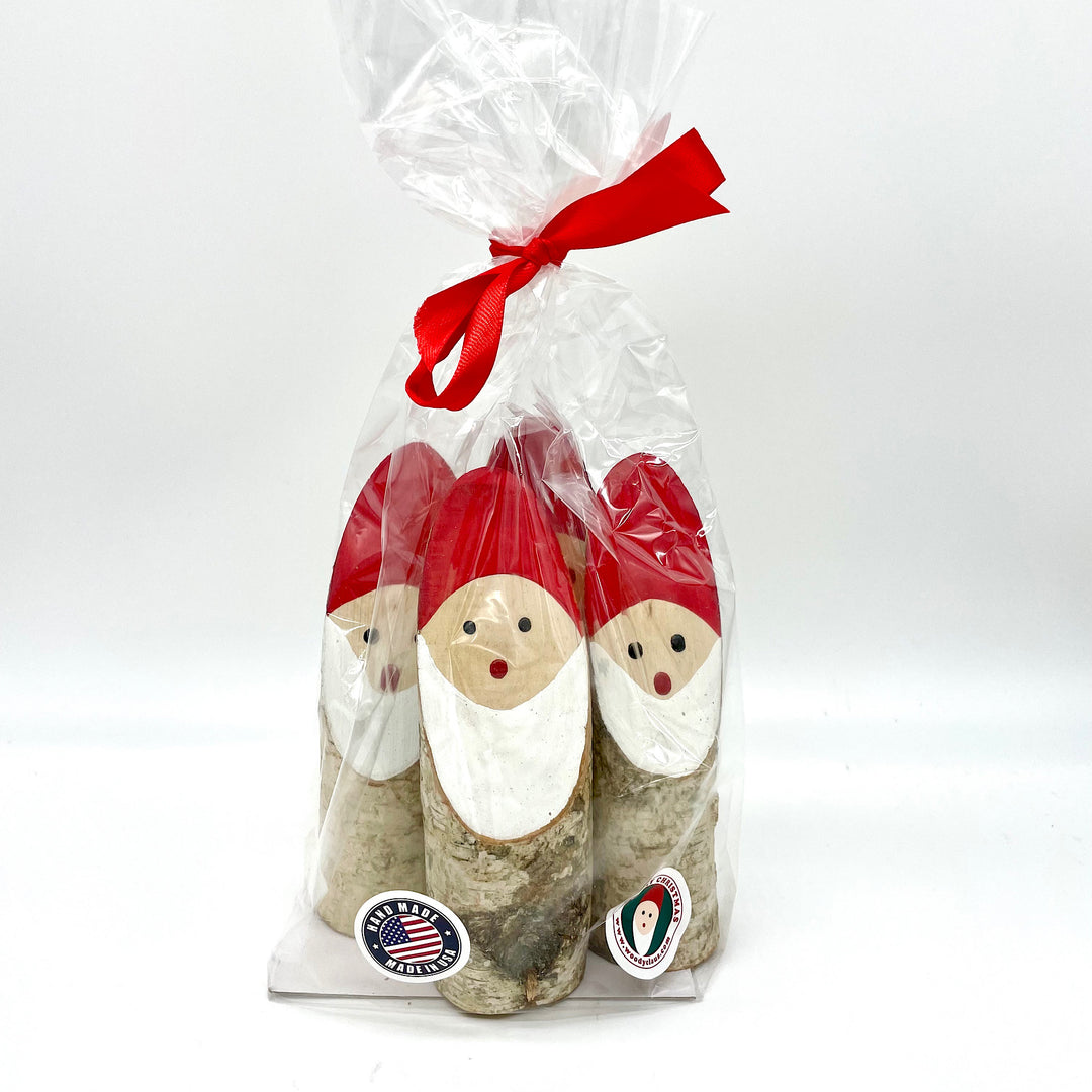 Handcrafted Set of Four Wood Santas