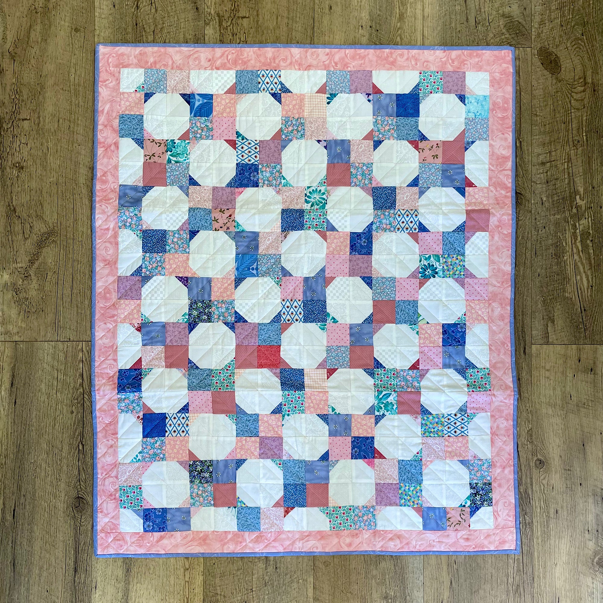 Pink and teal handmade baby quilt with tags, dramatic pinks outlets and dark teal with navy squares baby quilt, Tag quilt