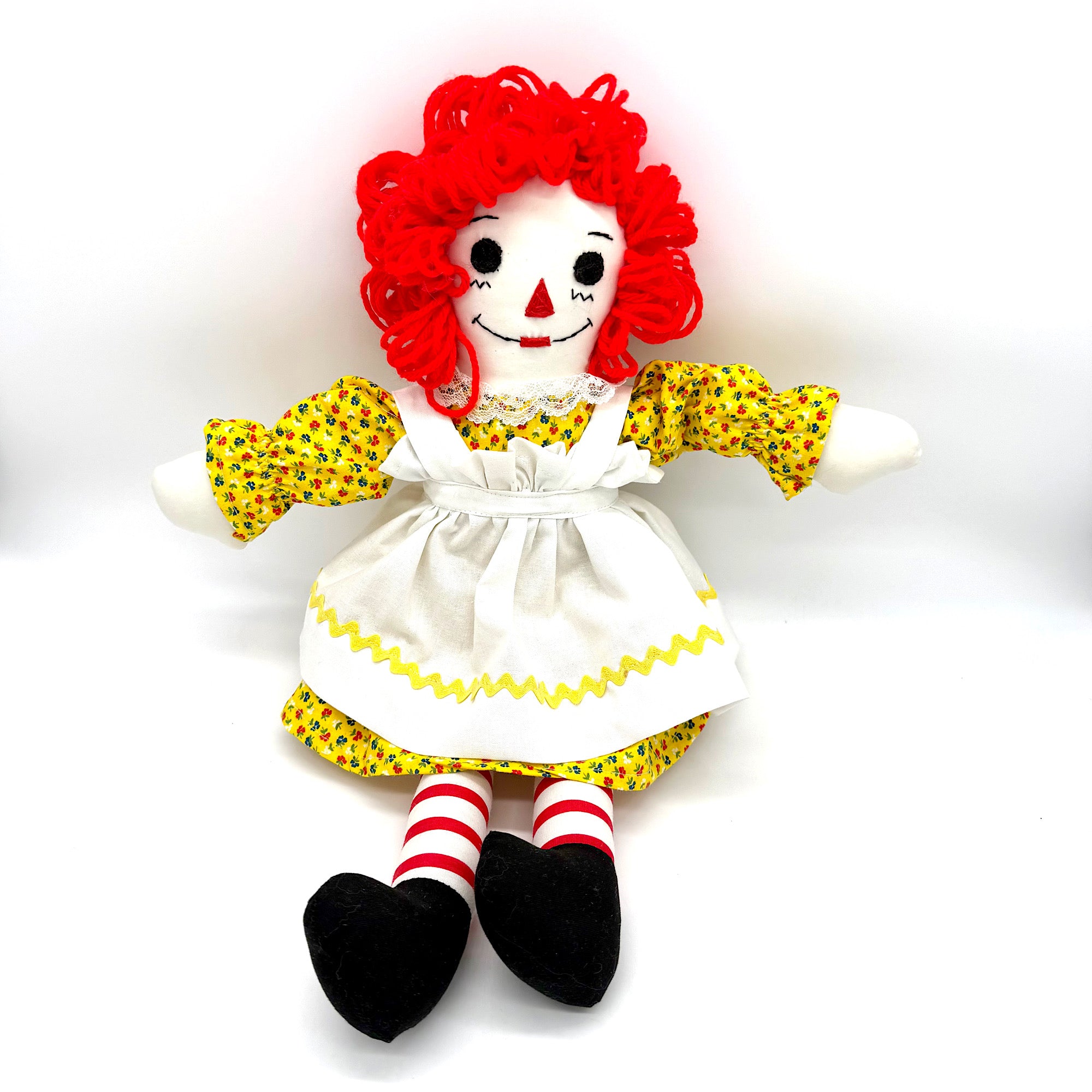 raggedy ann red dress doll cuddling and playing Collector's Item. Raggedy Ann Doll