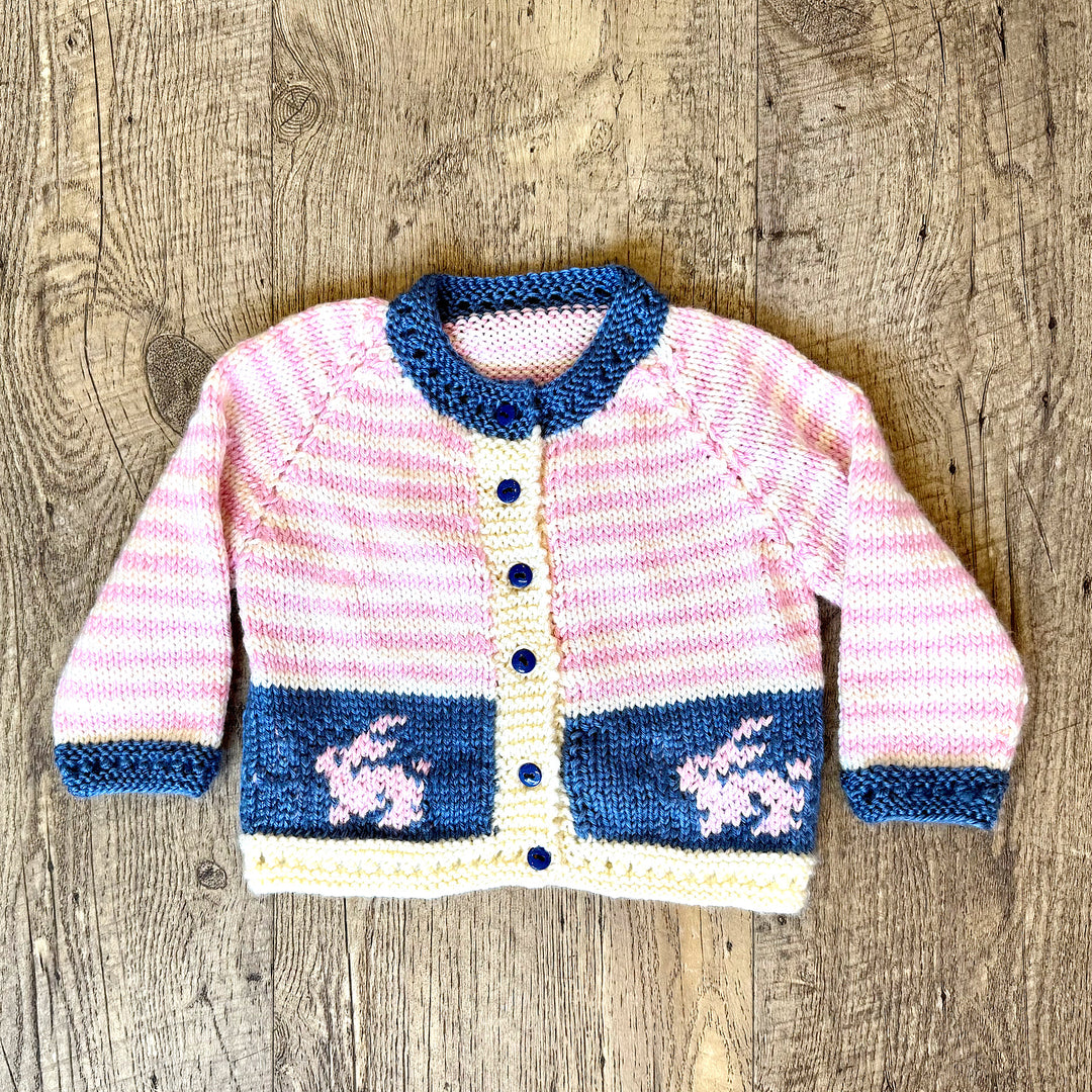 Hand Knit Pink, Off-White and Blue Cardigan with Pink Rabbits