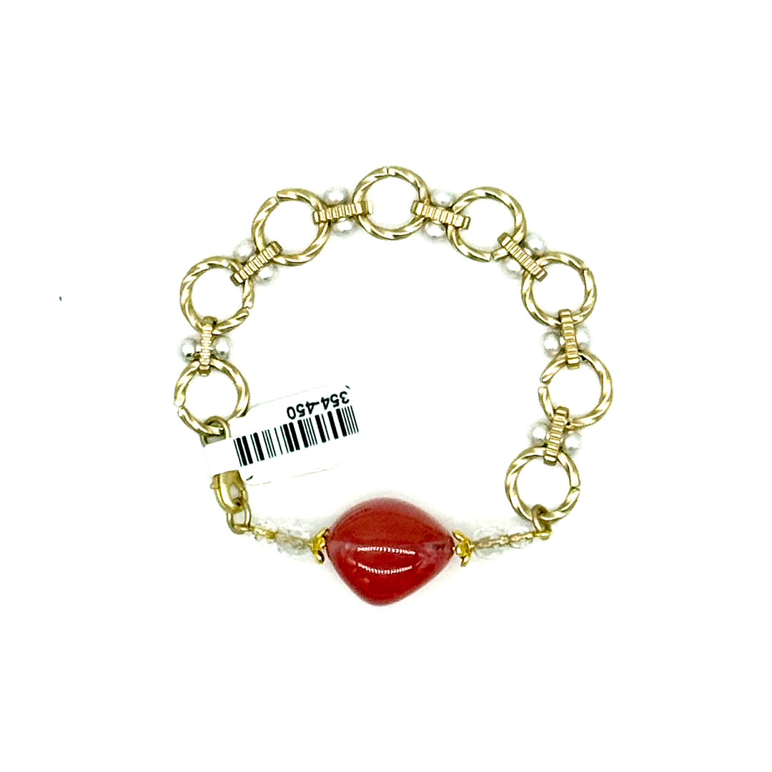 Handcrafted Bracelet with Twisted Goltone Circles and Salmon Cherry QuarBracelet