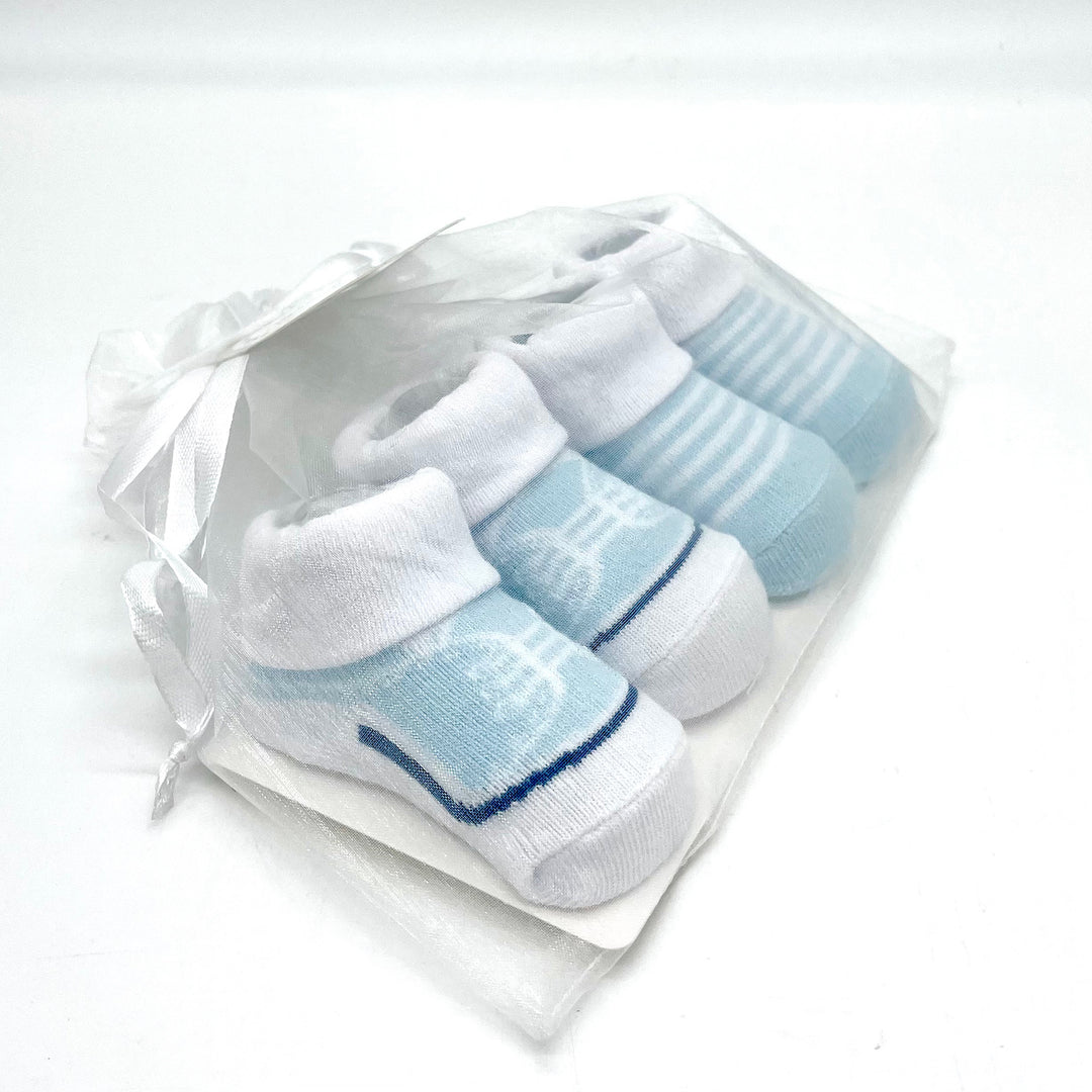 Two Sets of Blue and White Infant Socks